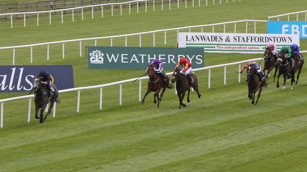 Curragh Sun 28 May 2017 Picture: Caroline Norris   Winter ridden by Ryan Moore running out the easy winner of The Tattersalls irish 1,000 Guineas from Roly Poly ridden by Seamus Heffernan, striped cap, 2nd, Hydrangea ridden by Padraig Beggy, 3rd, on rail