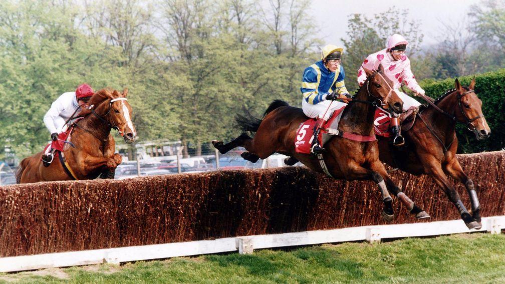 Cahervillahow (right) and Docklands Express clear the final fence together in the 1991 Whitbread Gold Cup