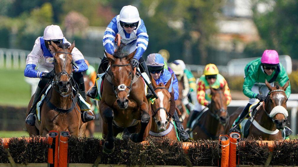 ESHER, ENGLAND - APRIL 23: Harry Cobden riding Knappers Hill (C, white cap) clear the last to win The bet365 Novices' Championship Final Handicap Hurdle at Sandown Park on April 23, 2022 in Esher, England. (Photo by Alan Crowhurst/Getty Images)