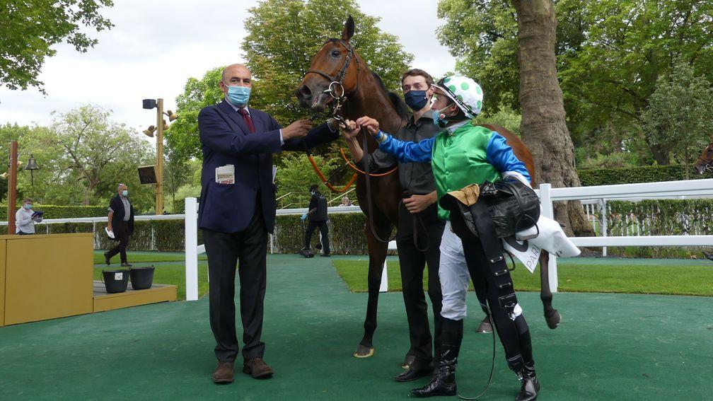 King's Harlequin flanked by Nicolas Clement (left) and Stephane Pasquier (right) after her success in the Listed Prix Roland de Chambure