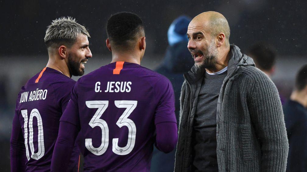 Pep Guardiola celebrates Manchester City's dramatic win with Sergio Aguero and Gabriel Jesus
