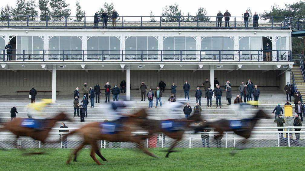 Racegoers watch the action in the opening raceLudlow 2.12.20 Pic: Edward Whitaker/Racing Post