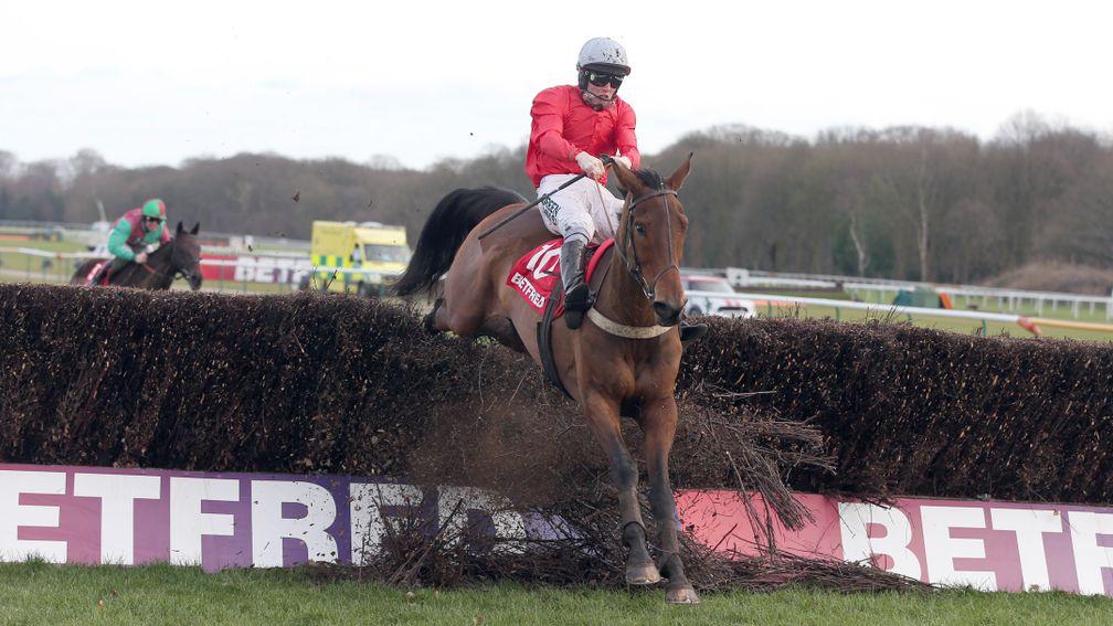 Well Refreshed ploughs through the final fence en route to victory in the Grand National Trial in 2013
