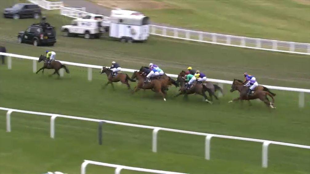 Subjectivist (green) is clear with Frankie Dettori (yellow cap) tucked on the rail