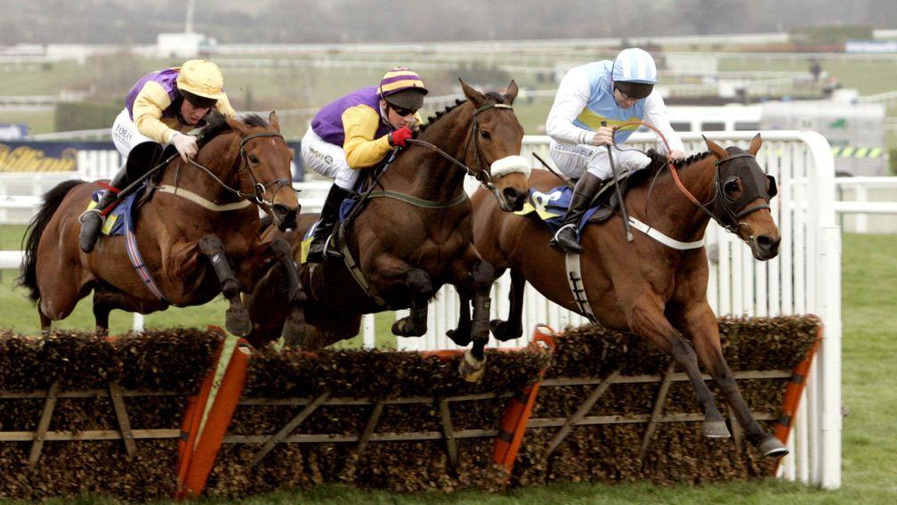 Hardy Eustace (right) leads Harchibald (centre) over a flight during the closing stages of the 2005 Champion Hurdle