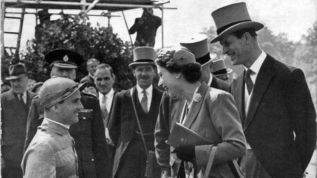 The Queen and Prince Philip chat with Gordon Richards at the Derby in 1953 just four days after her coronation