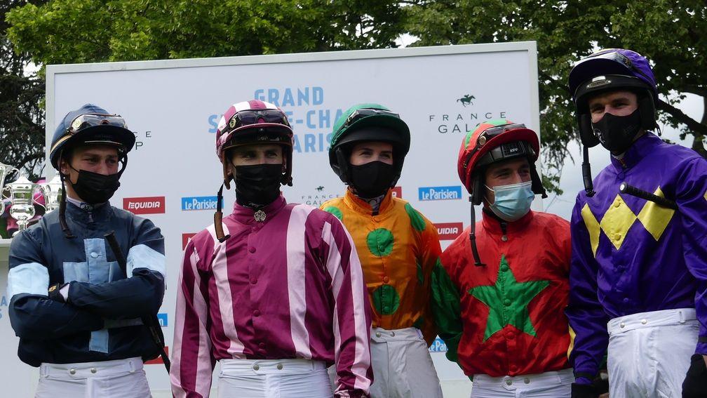 Rachael Blackmore (orange silks) and Danny Mullins (purple silks on right of picture) before the Grand Steeple-Chase de Paris