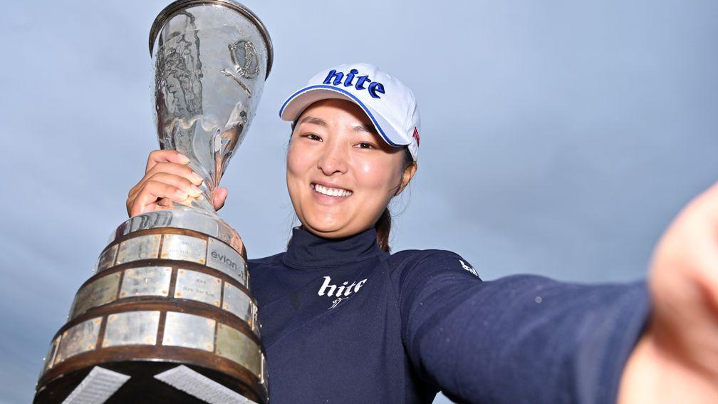 Jin Young Ko poses with the Evian Championship trophy