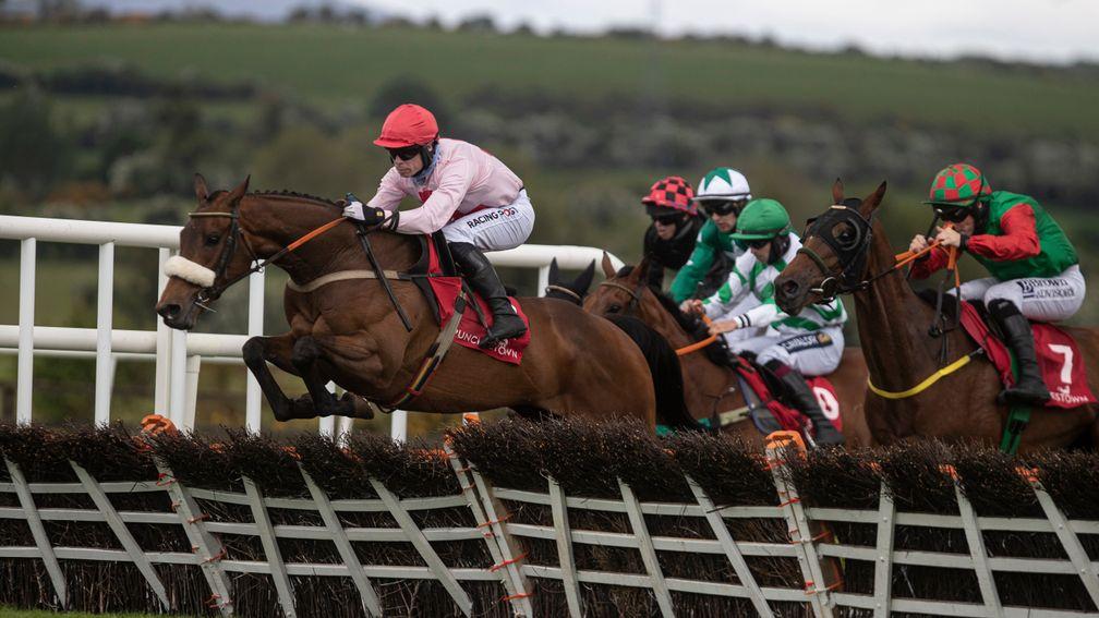 Arcadian Sunrise and Denis O'Regan hit the front in the 2m handicap hurdle at Punchestown