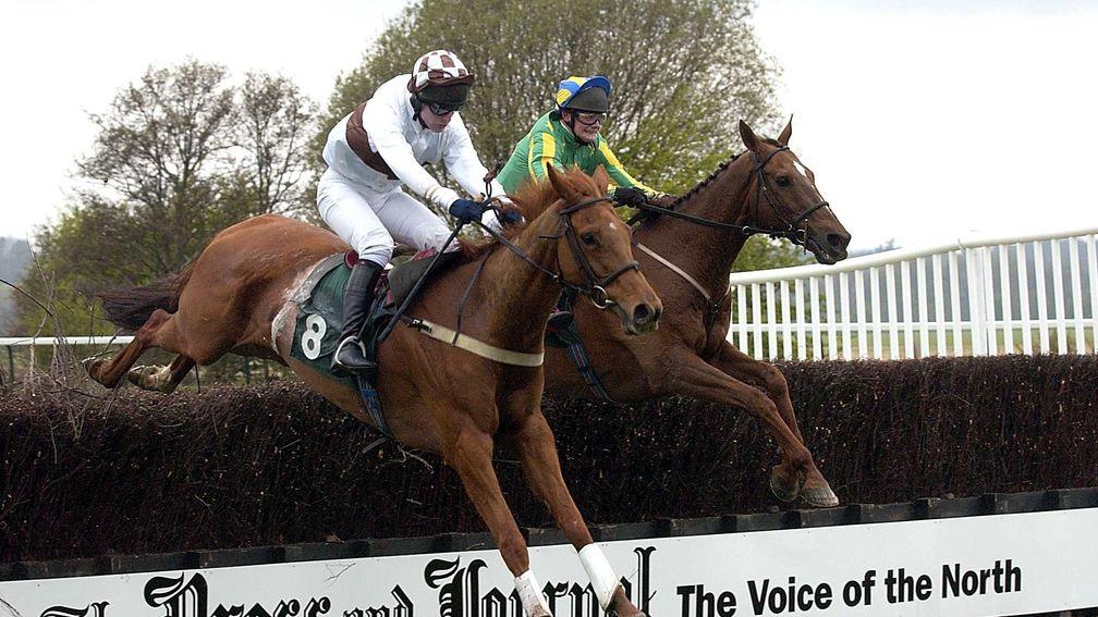 Rockcliffe Gossip (right) won the first Highland National for Nigel Twiston-Davies in 2003