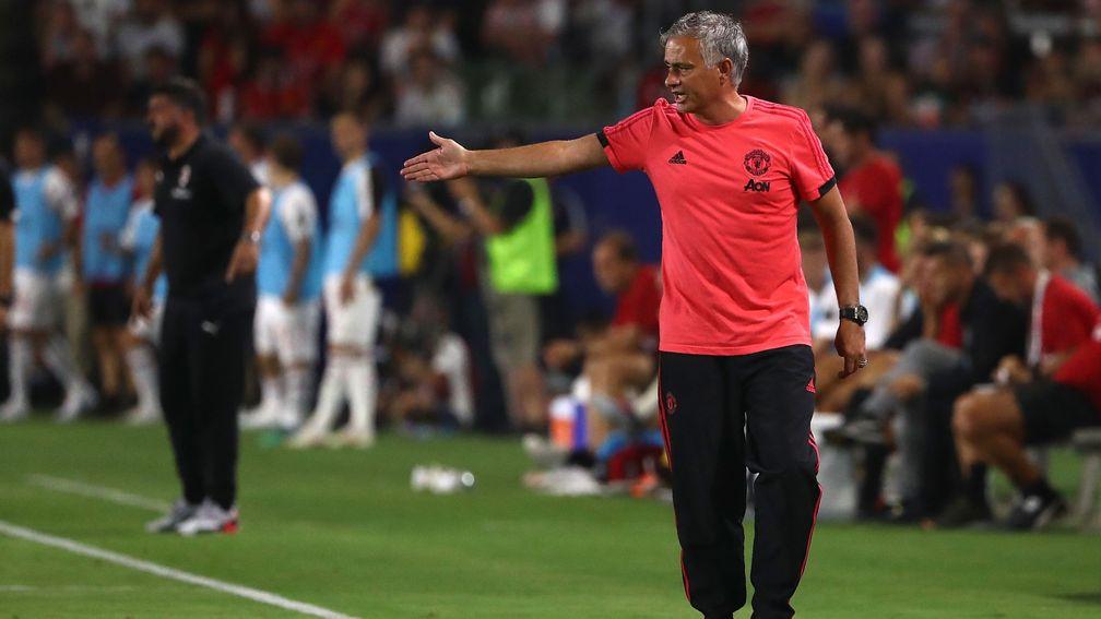 Manchester United manager Jose Mourinho paces on the sideline during his side's defeat to Milan