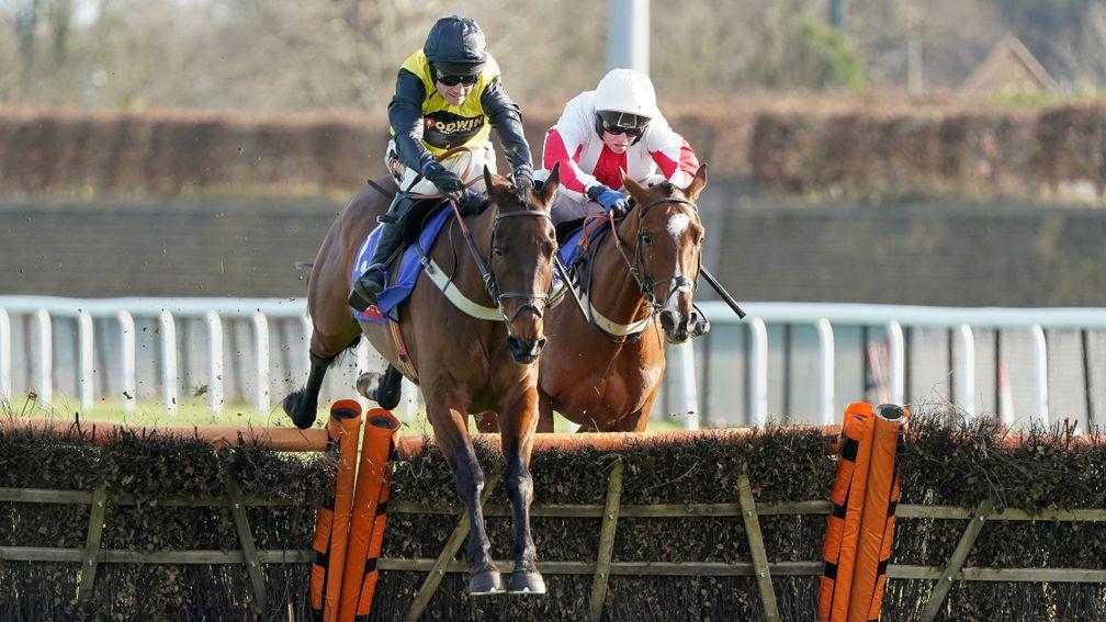 SUNBURY, ENGLAND - FEBRUARY 26: Tom Cannon riding Aucunrisque (black/yellow) clear the last to win The Sky Bet Dovecote Novices' Hurdle at Kempton Park Racecourse on February 26, 2022 in Sunbury, England. (Photo by Alan Crowhurst/Getty Images)
