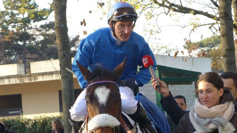 Soon-to-retire Jacques Ricou is interviewed after landing the big of the day at Auteuil