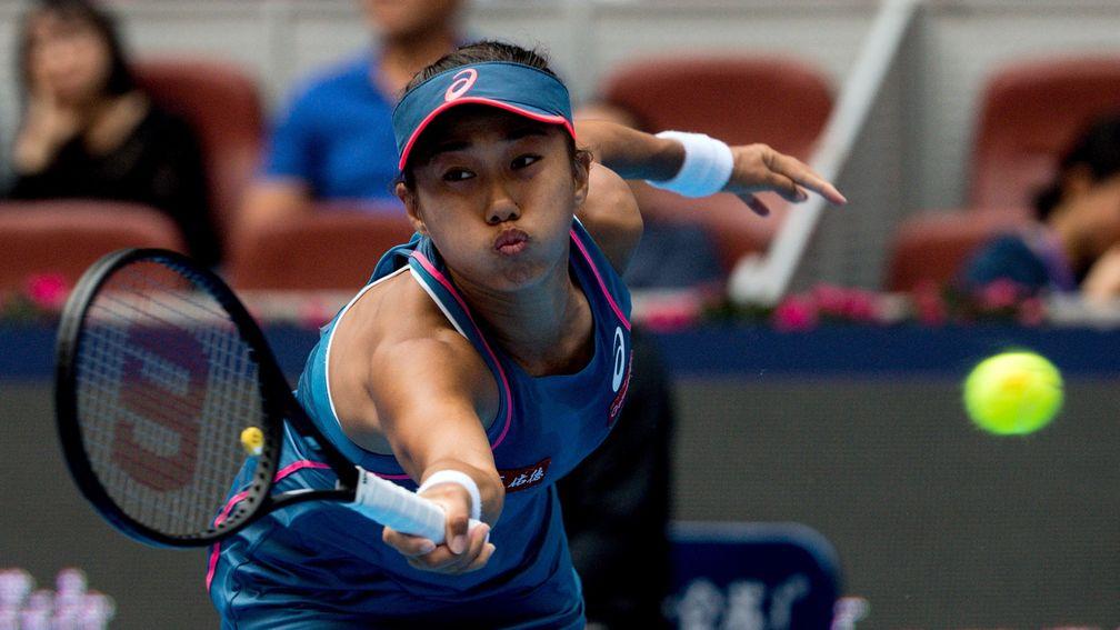 Shuai Zhang reaches wide against Naomi Osaka in Beijing last week