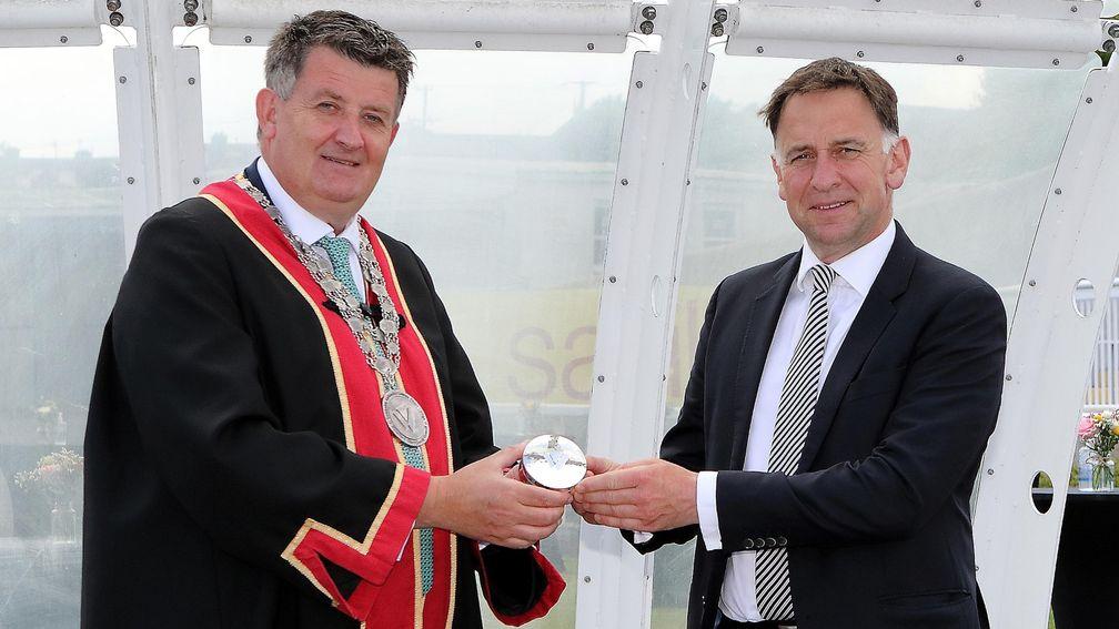 The master trainer is presented with a silver Freedom Box by Mayor Damien Geoghegan