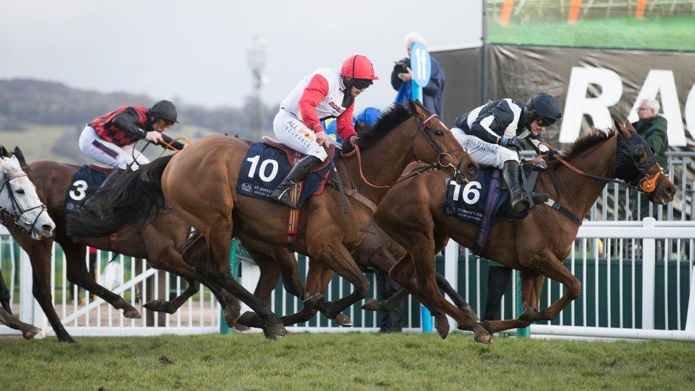 Pacha Du Polder and Harriet Tucker (nearside) collar Top Wood near the finish of the St. James's Place Foxhunter Challenge Cup