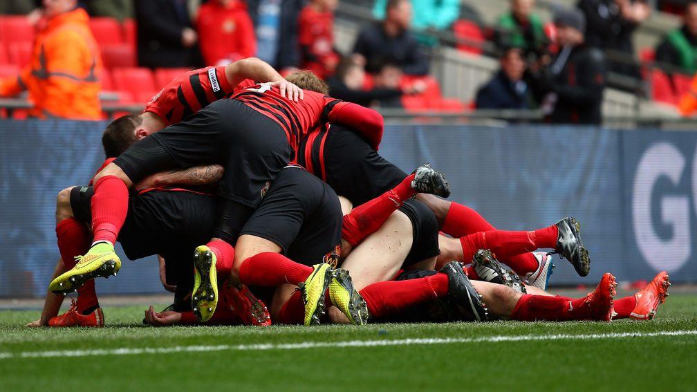 Wrexham pile on after scoring a goal