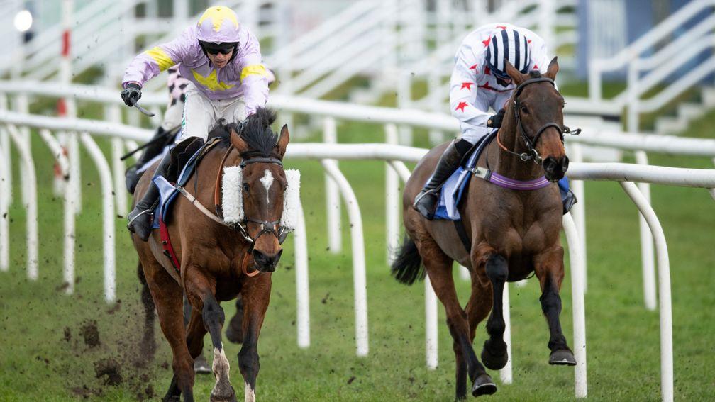 Takingrisks (left) edges out Aye Right (right) in a thrilling finish to the Sky Bet Handicap Chase at Doncaster