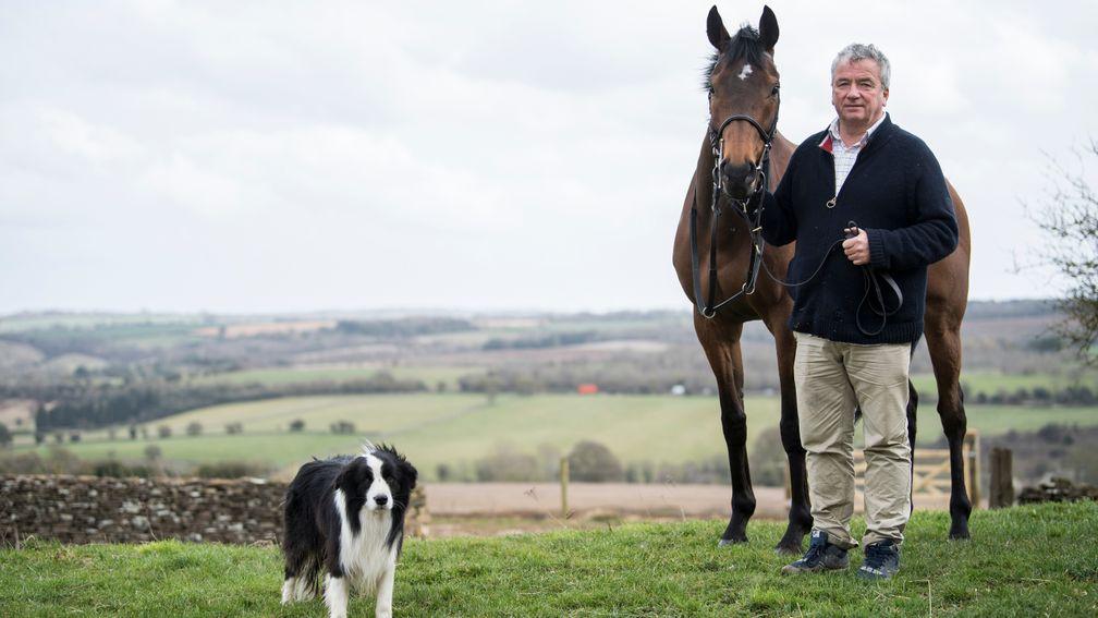 Nigel Twiston-Davies with leading Grand National contender Blaklion and Stan the Border Collie