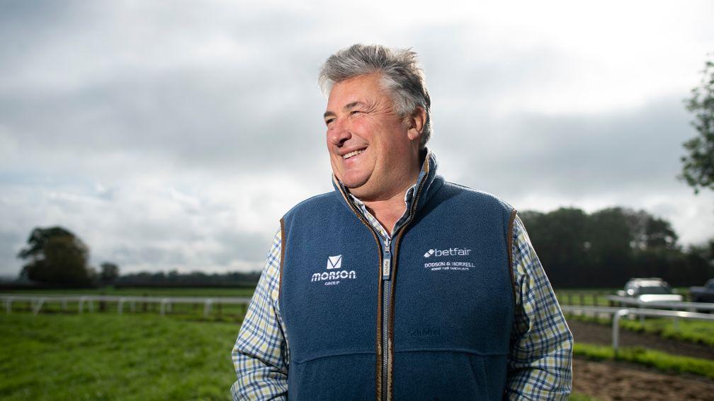 Paul Nicholls sports a big smile on the gallops at Manor Farm Stables