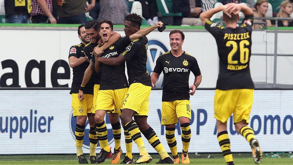 Borussia Dortmund celebrate a goal against Wolfsburg