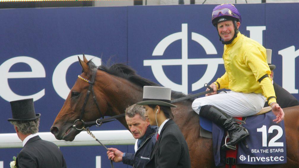 Mick Kinane is led in on Sea The Stars after Derby victory