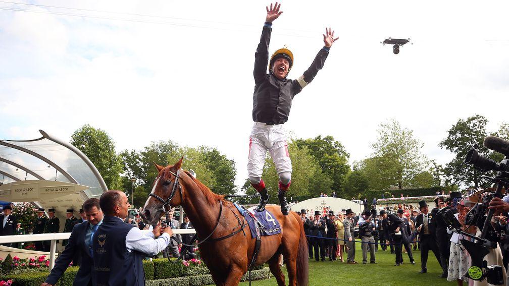 Frankie Dettori performs a flying dismount from Gold Cup winner Stradivarius