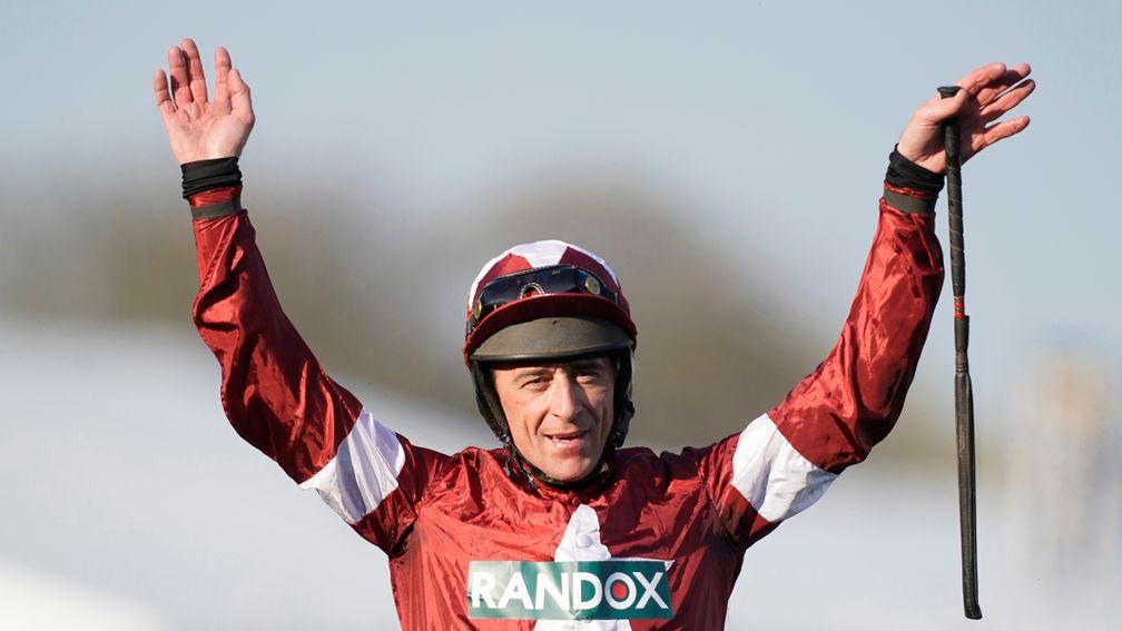Celebration time: Davy Russell is all smiles after Tiger Roll's victory