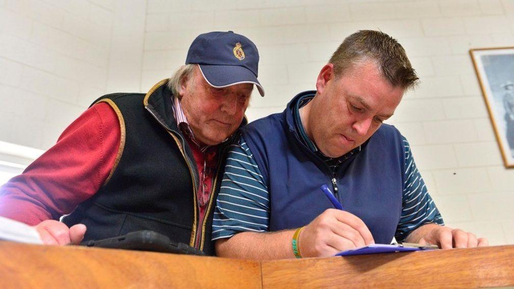 Bobby O'Ryan (left) and Aidan 'Mouse' O'Ryan sign for the joint sale-topper
