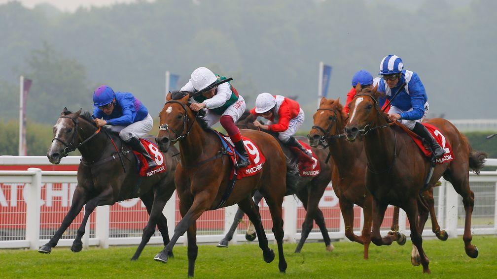 Without Parole and Frankie Dettori (white cap) come home in front in the 2018 Heron Stakes at Sandown