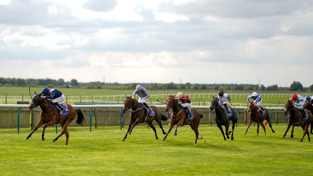 NEWMARKET, ENGLAND - SEPTEMBER 23: Robert Havlin riding Commissioning win The Al Basti Equiworld, Dubai Rockfel Stakes at Newmarket Racecourse on September 23, 2022 in Newmarket, England. (Photo by Alan Crowhurst/Getty Images)