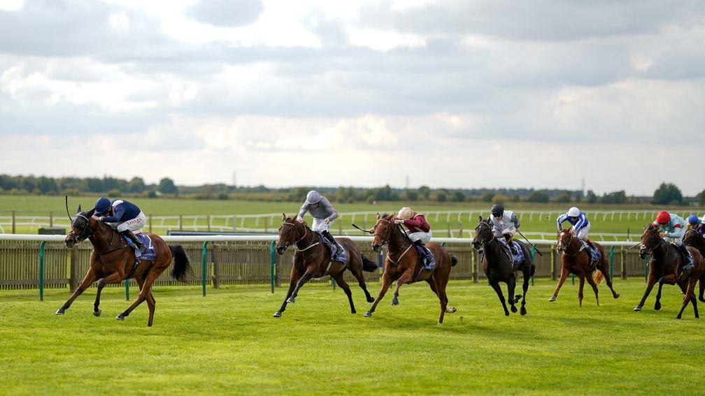 NEWMARKET, ENGLAND - SEPTEMBER 23: Robert Havlin riding Commissioning win The Al Basti Equiworld, Dubai Rockfel Stakes at Newmarket Racecourse on September 23, 2022 in Newmarket, England. (Photo by Alan Crowhurst/Getty Images)