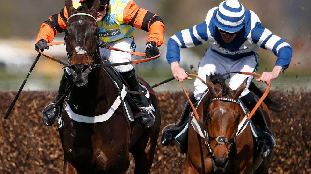 Might Bite (left) keeps Whisper at arm's length at Aintree in April