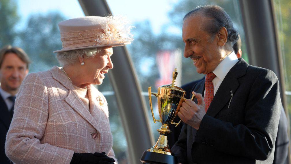 The Queen presenting Prince Khalid Abdullah with the winner's trophy after Frankel's QEII success in 2011