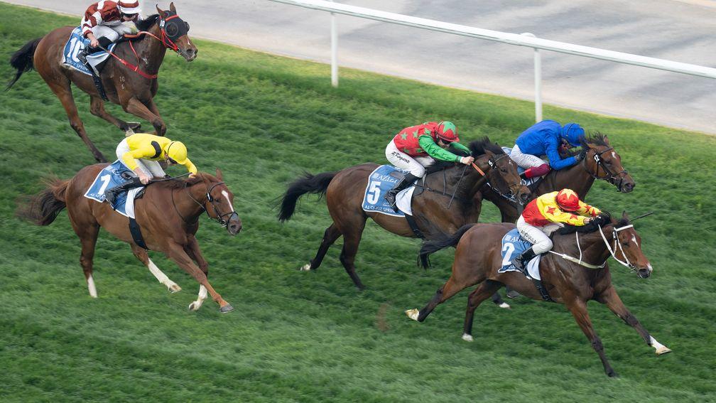 California Spangle (red and yellow) beats Star Of Mystery (blue) in the Al Quoz Sprint