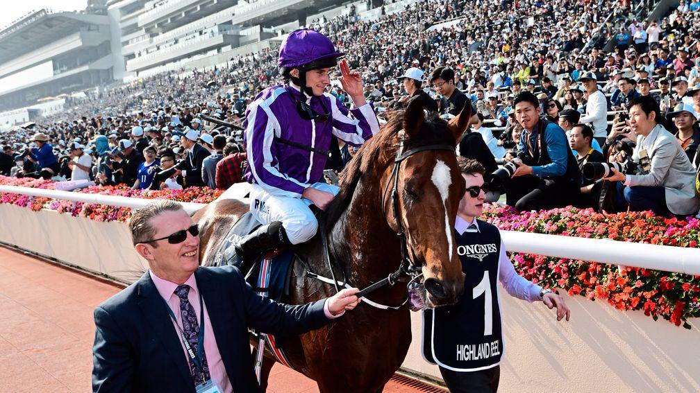 Highland Reel and Ryan Moore receive due adulation from the crowd after a second victory in the Hong Kong Vase