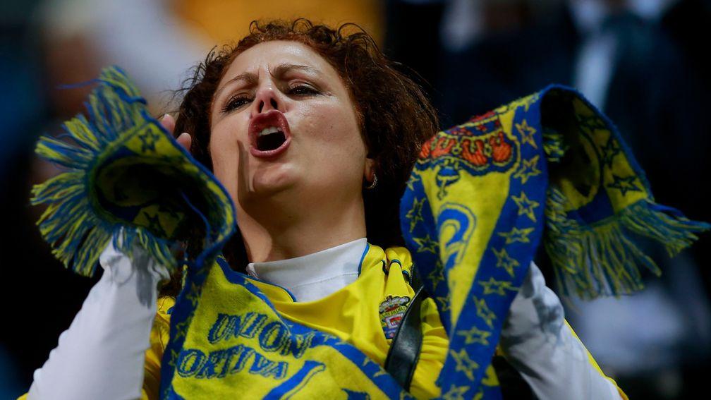 A Las Palmas fan cheers on her team in the 3-3 draw at Real Madrid