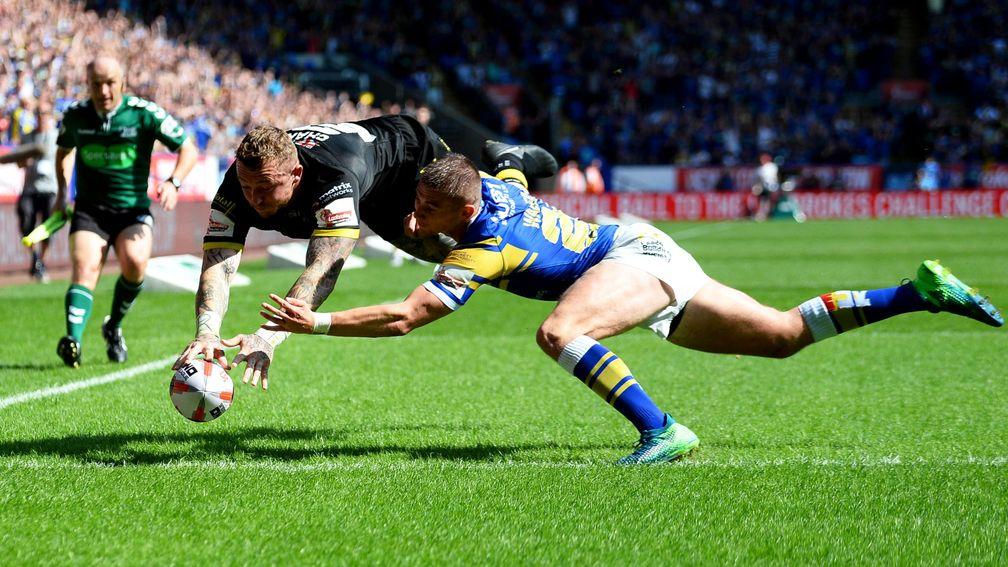 Leeds concede a try to Josh Charnley during last week's cup thrashing by Warrington