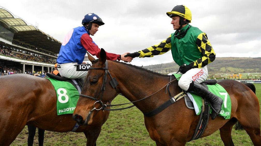 CHELTENHAM, ENGLAND - MARCH 12: Adam Wedge riding Lisnagar Oscar is congratulated by Aidan Coleman riding Paisley Park after winning the Paddy Power Stayers' Hurdle (Grade 1) at Cheltenham Racecourse on March 12, 2020 in Cheltenham, England. (Photo by Dan