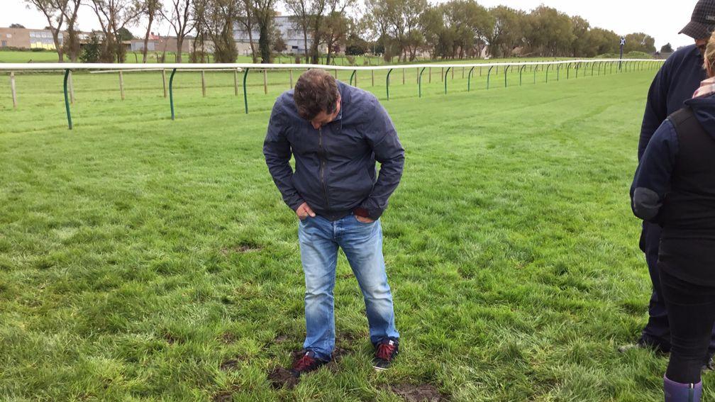 Noel Wilson inspects the controversial spot at Ayr