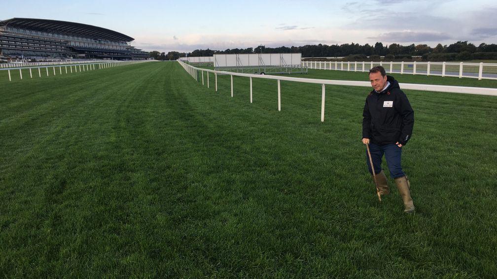 Ascot clerk of the course Chris Stickels stands where runners in three of the Champions Day races will enter what is normally the home straight of the track's hurdles course.