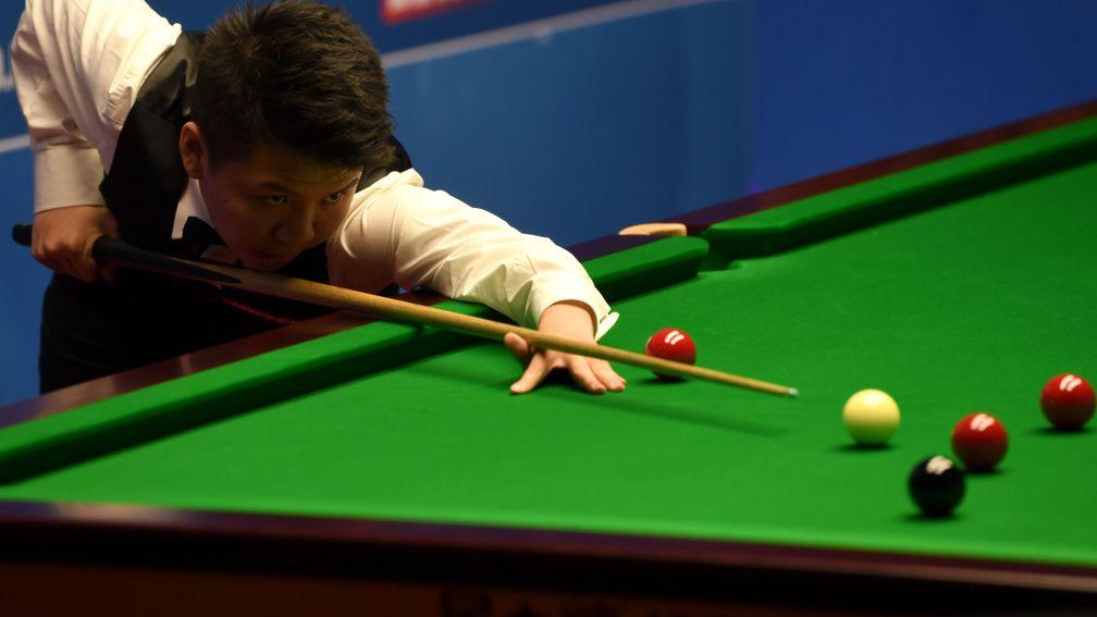 Zhou Yuelong is a hot favourite to silence Jimmy White on Saturday afternoon but the Whirwind could play his part in an entertaining clash