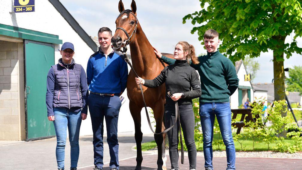 Andy Shinnick (blue jumper) and Johnny (green jumper) with their first ever pinhook, a Make Believe filly sold for €170,000 at Tattersalls Ireland 