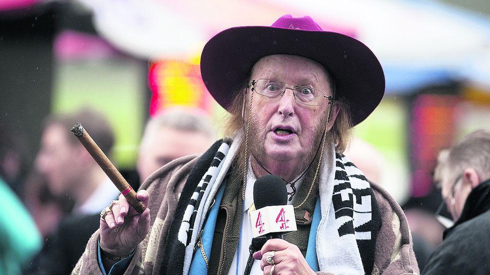 John McCririck: the avid Newcastle fan sports a black and white scarf in the betting ring at Newbury in 2012