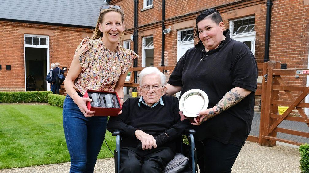 Johnny Tolton with granddaughters Melanie Bullen (right) and Alison Webb finally receives his prize