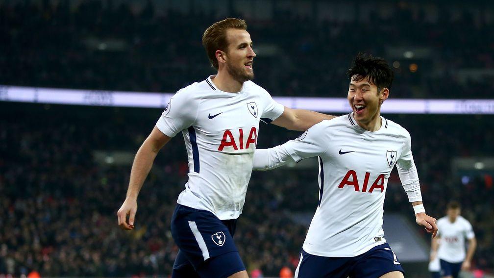 Harry Kane celebrates with teammate Heung-Min Son
