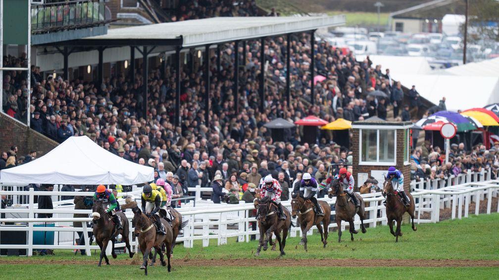 The winner Aucunrisque (Tom Cannon,2nd left) leads past the stands in the 2m novice hurdlePlumpton 2.1.22 Pic: Edward Whitaker