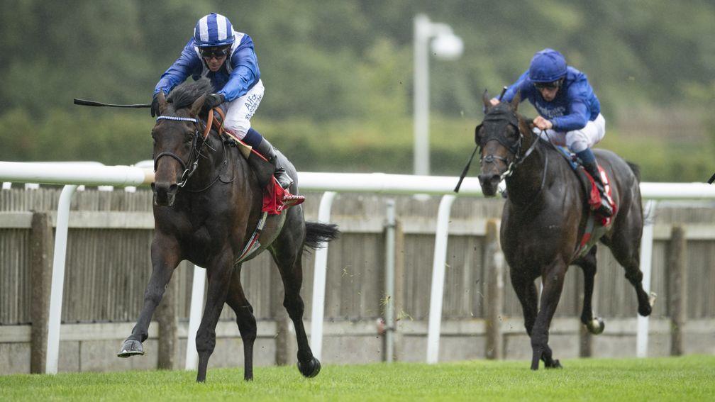 Al Aasy (Jim Crowley, left) wins the Bahrain Trophy at Newmarket's July meeting with third-placed Al Dabaran left trailing