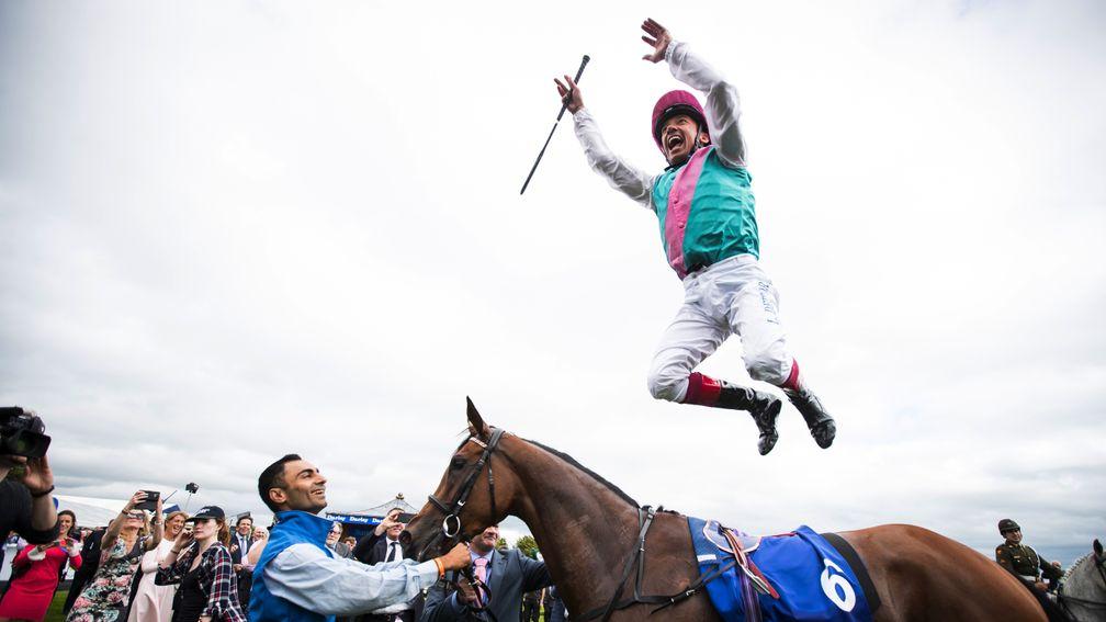 Frankie Dettori with his trademark ﬂying dismount after winning the Irish Oaks