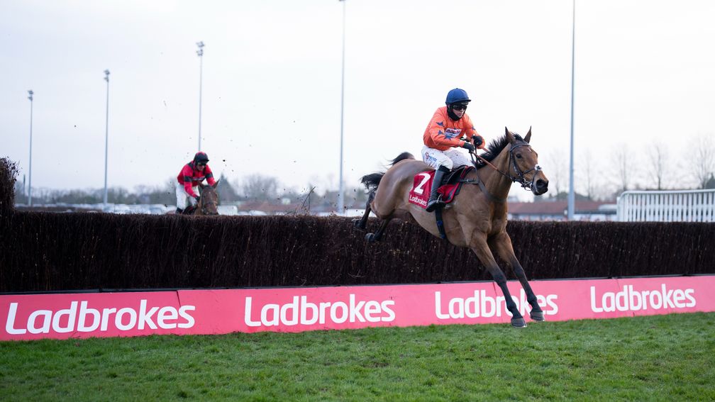 Bravemansgame (Harry Cobden) leads Ahoy Senor over the last fence in the Kauto Star Novices ChaseKempton 26.12.21 Pic: Edward Whitaker